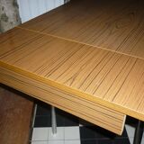 Brown formica table with 2 extension cords and drawer