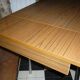 Table en formica marron avec 2 rallonges et tiroir