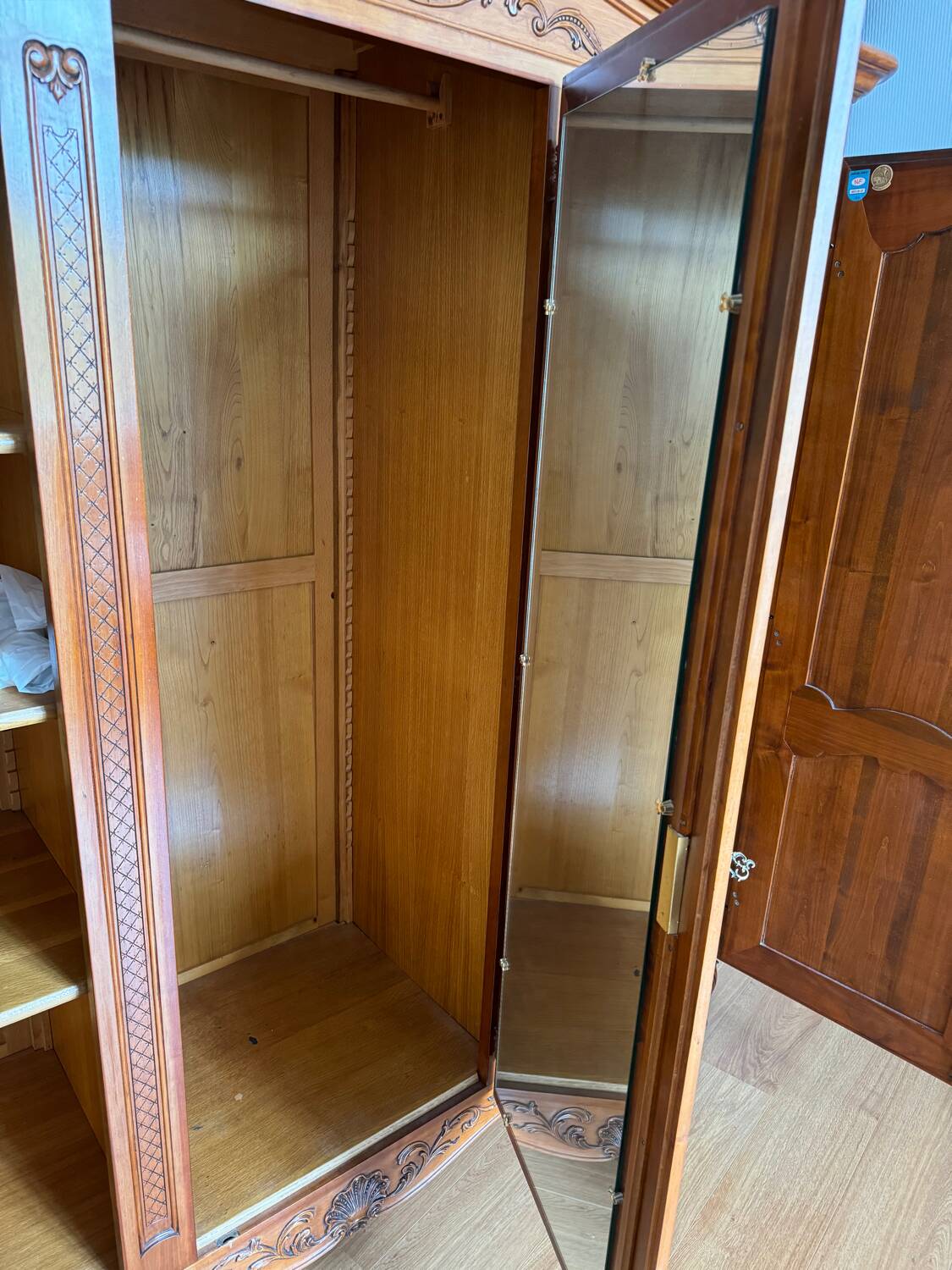 Three-door wardrobe in Regency style