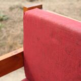 Pair of pine fireside chairs, France, 1960s, "raspberry" cushions