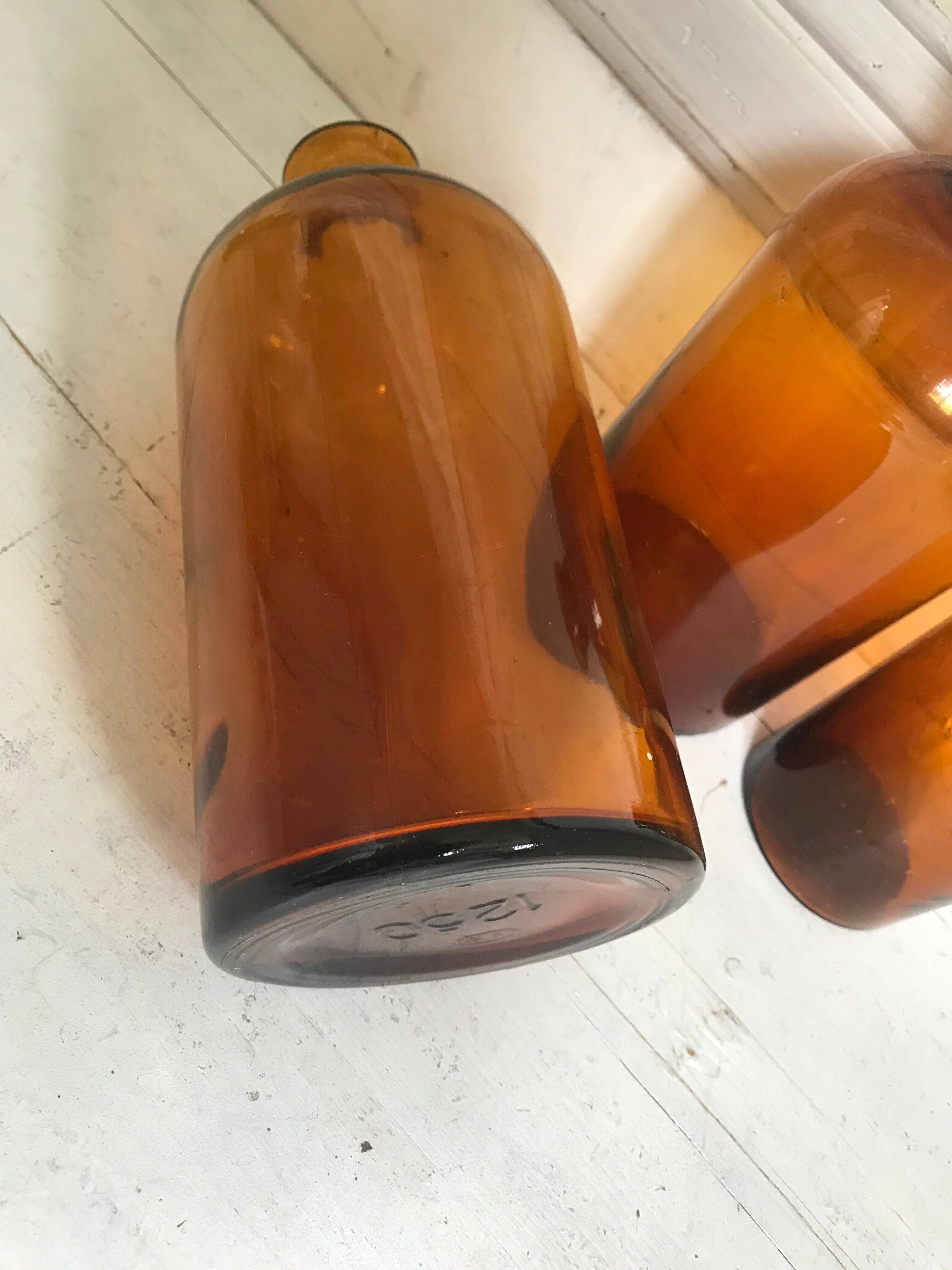 Trio of apothecary bottles