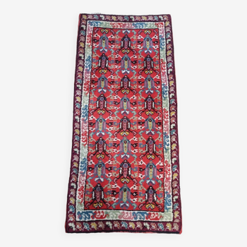 Tapis vintage en laine fait main