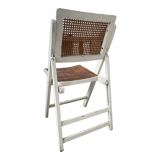 4 folding chairs with wicker seating