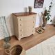 Chest of drawers with rounded front