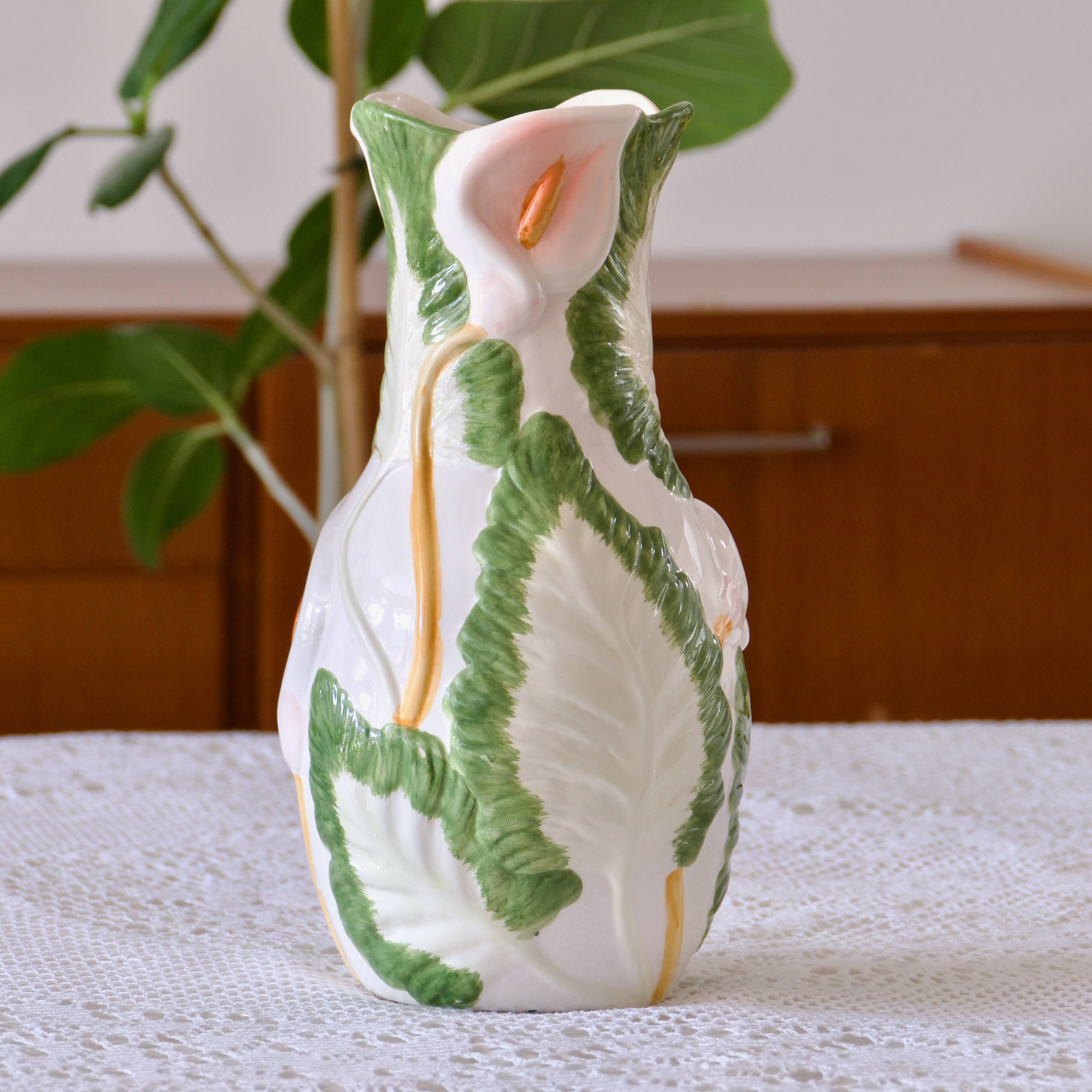 Large slip vase of Arum flowers