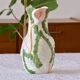 Large slip vase of Arum flowers