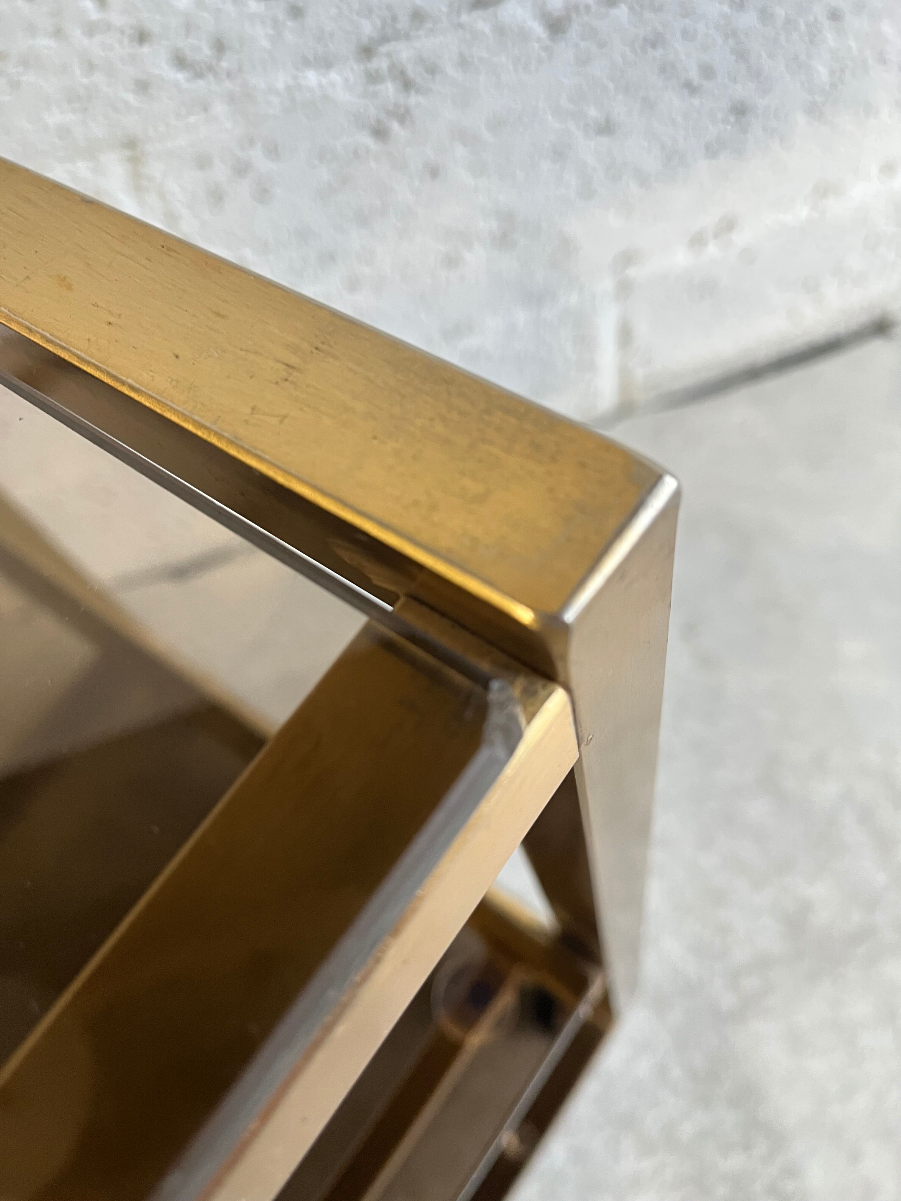 Gold metal and smoked glass serving trolley from the 70s