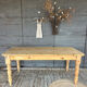 Raw wood dining table