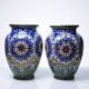 A pair of large decorative vases by Carla Holland, Gouda decoration, circa 1930-40.