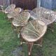 Set of 4 armchairs and 1 vintage rattan bench (5 pieces) inseparable.