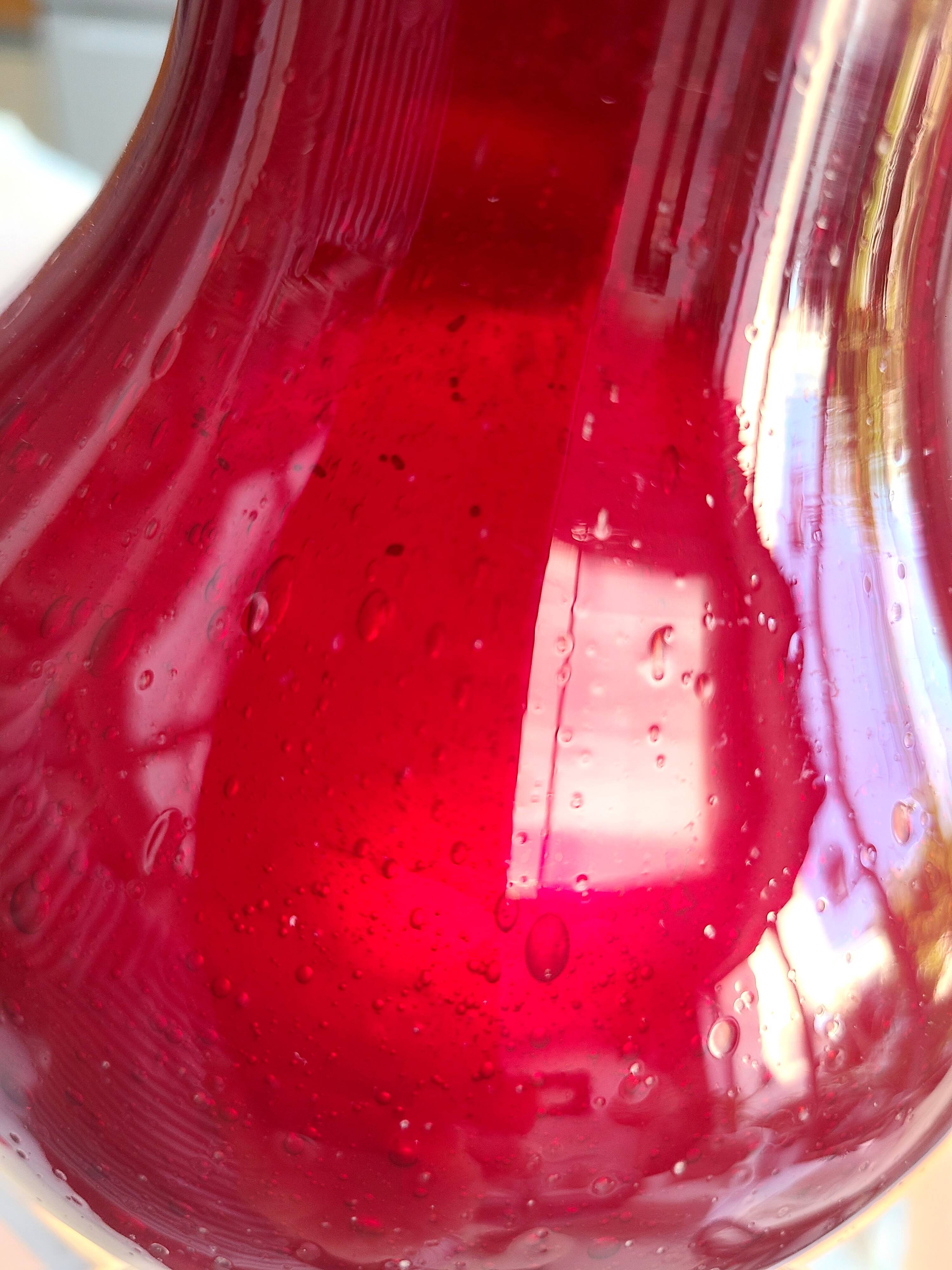 Antique mouth-blown glass vase
