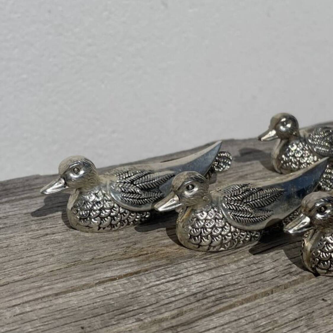 12 silver-plated metal knife rests with duck design