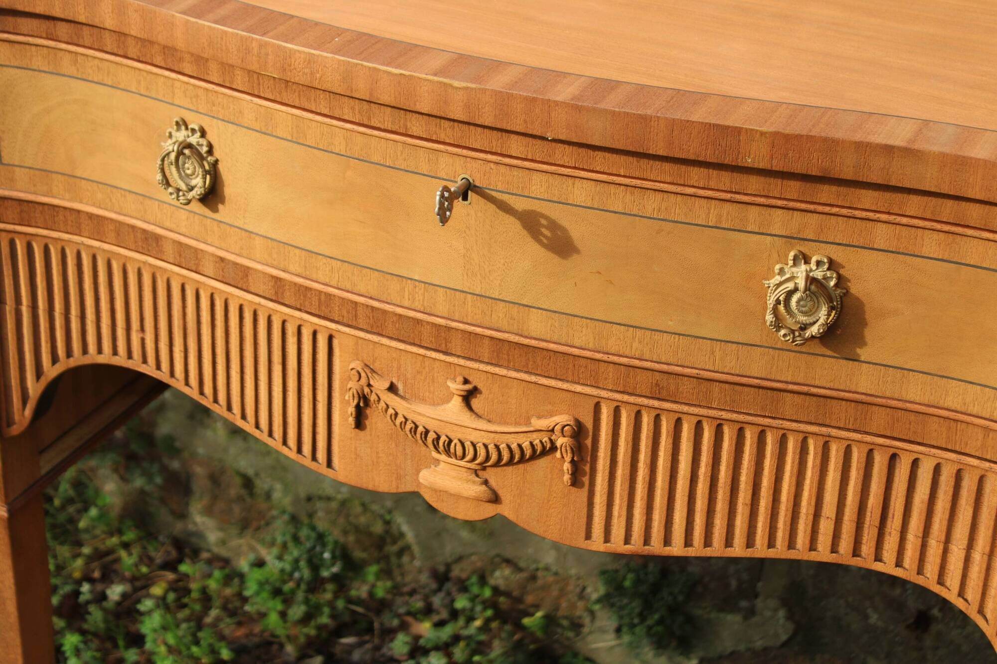 English-made enfilade in Louis XVI style with light wood veneers.
