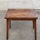 Scandinavian extendable dining table with storage in 19th-century oak.