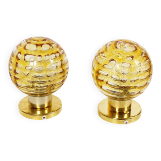 Pair of vintage amber glass and brass metal wall lamps by Doria