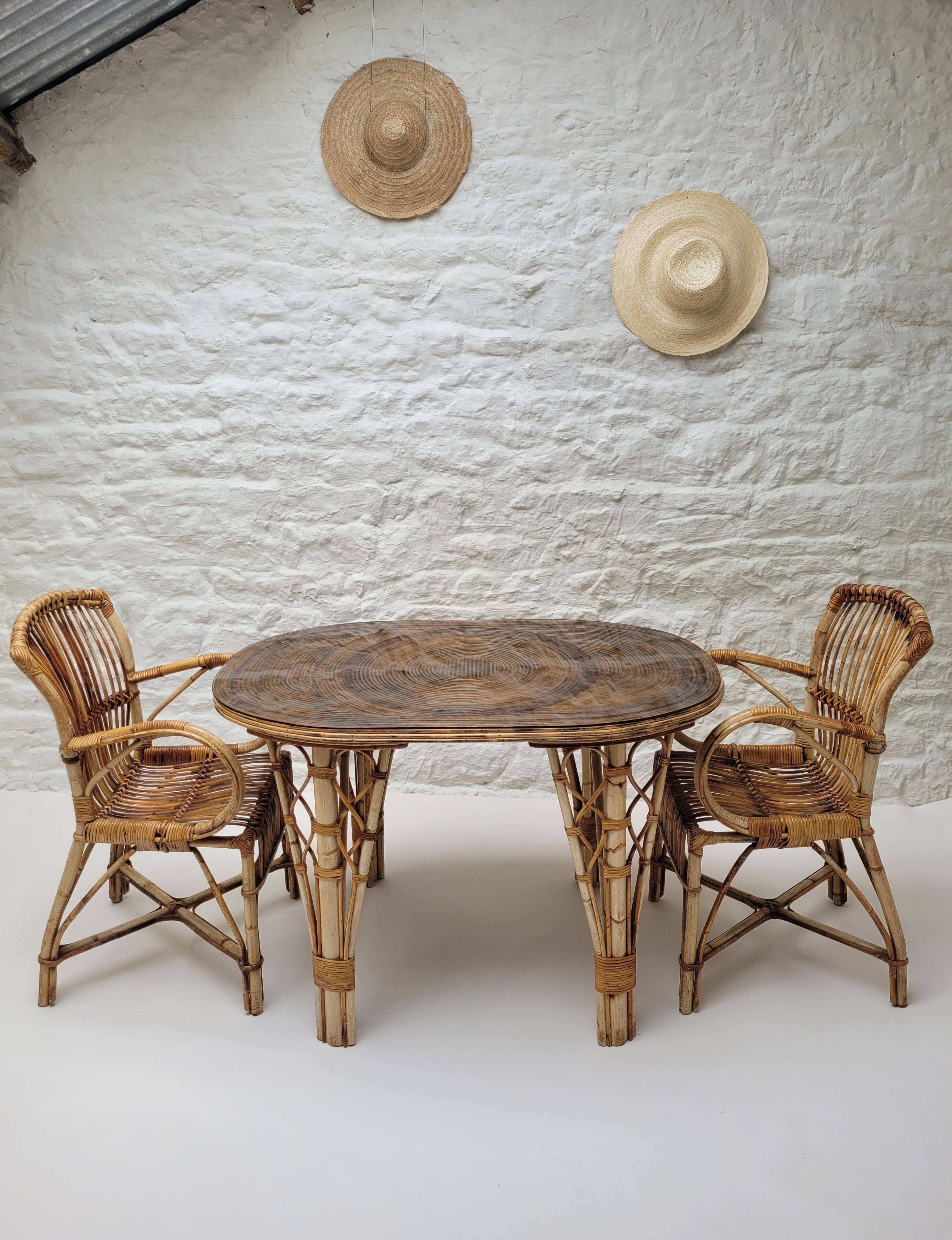 Audoux Minet duo table with bamboo rattan and smoked glass armchairs