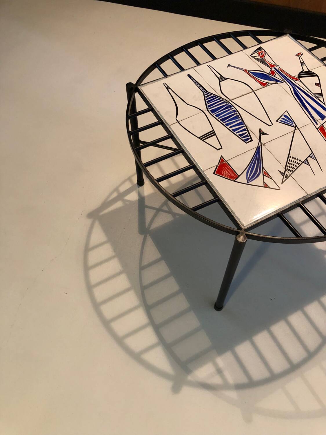 Modernist coffee table in steel and ceramic 1950