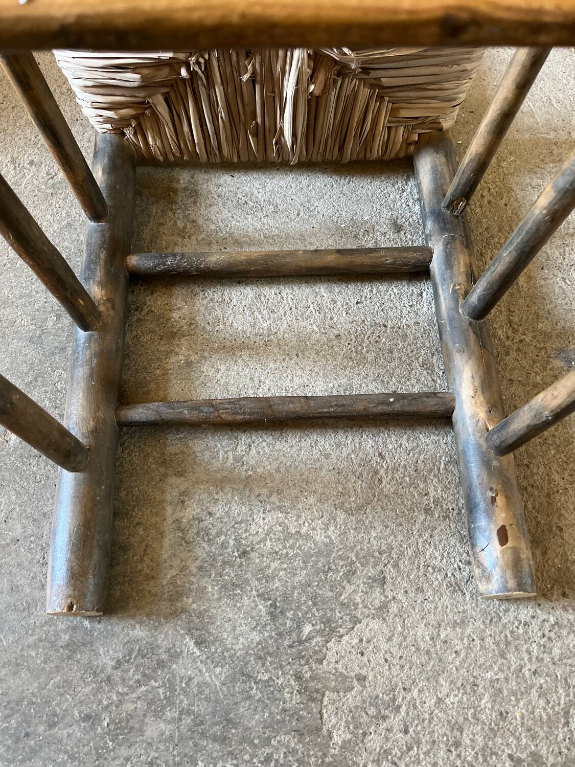 Old turned and stuffed wooden chair