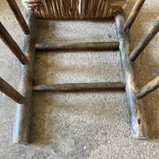 Old turned and stuffed wooden chair