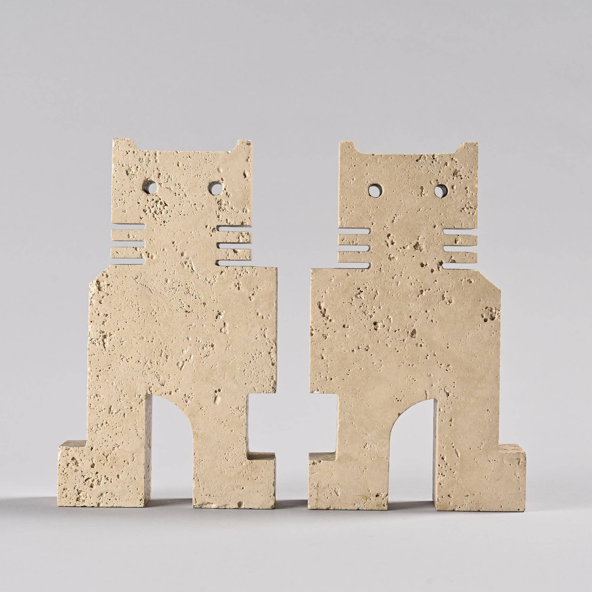 Pair of stylised cats in travertine, Fratelli Manelli, Italy, circa 1970.