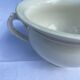 Old Digoin chamber pot in white earthenware – repurposed as a dice bowl.