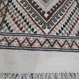 White carpet with multicolored Berber patterns handmade