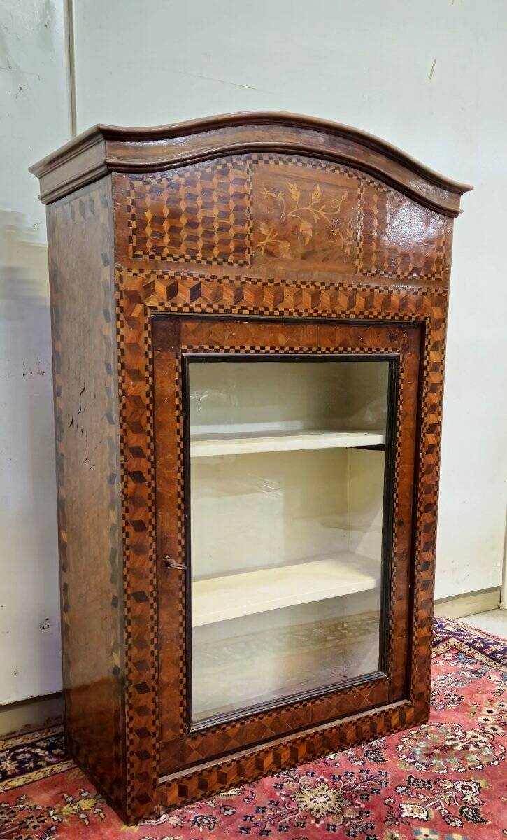 Antique Louis XV display cabinet with geometric marquetry decoration.