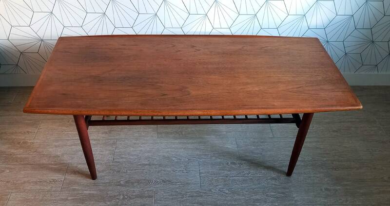 Danish 1960s teak coffee table with slatted shelf.