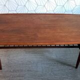 Danish 1960s teak coffee table with slatted shelf.