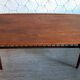 Danish 1960s teak coffee table with slatted shelf.