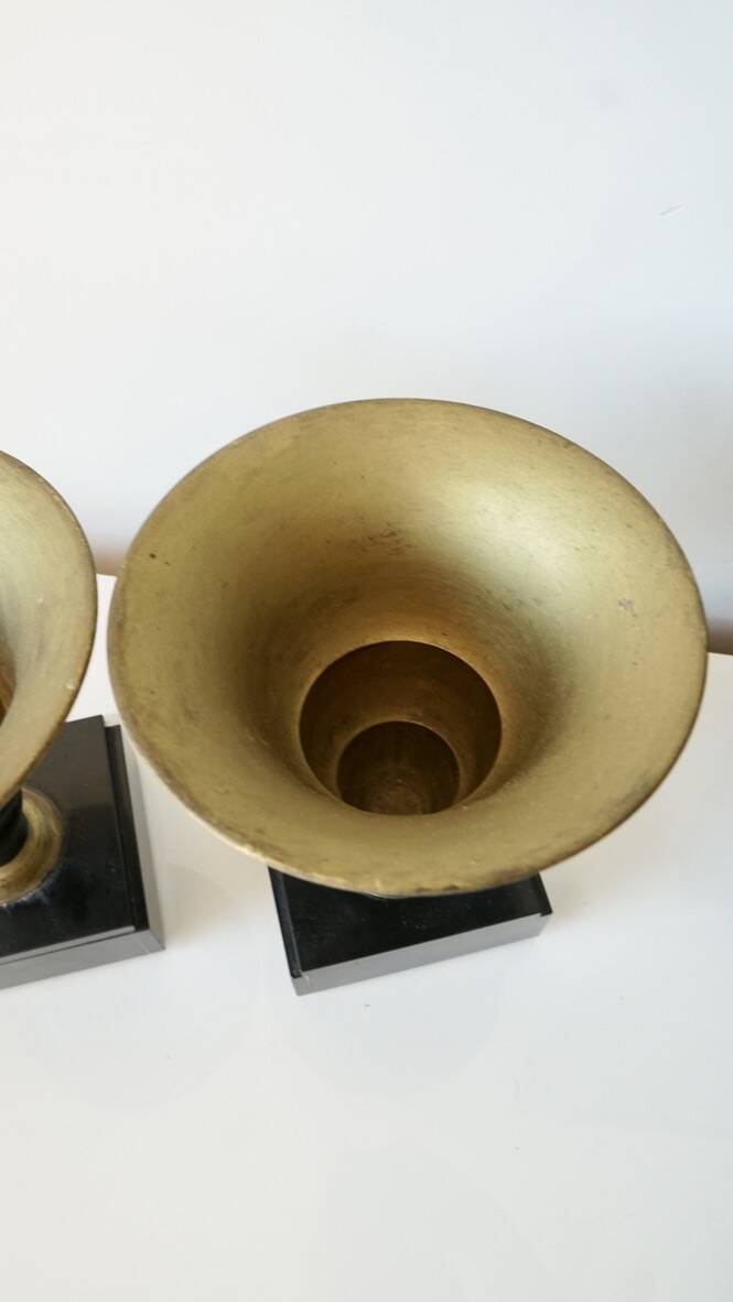 Pair of Art Deco enamelled brass casseroles, black and white marble base