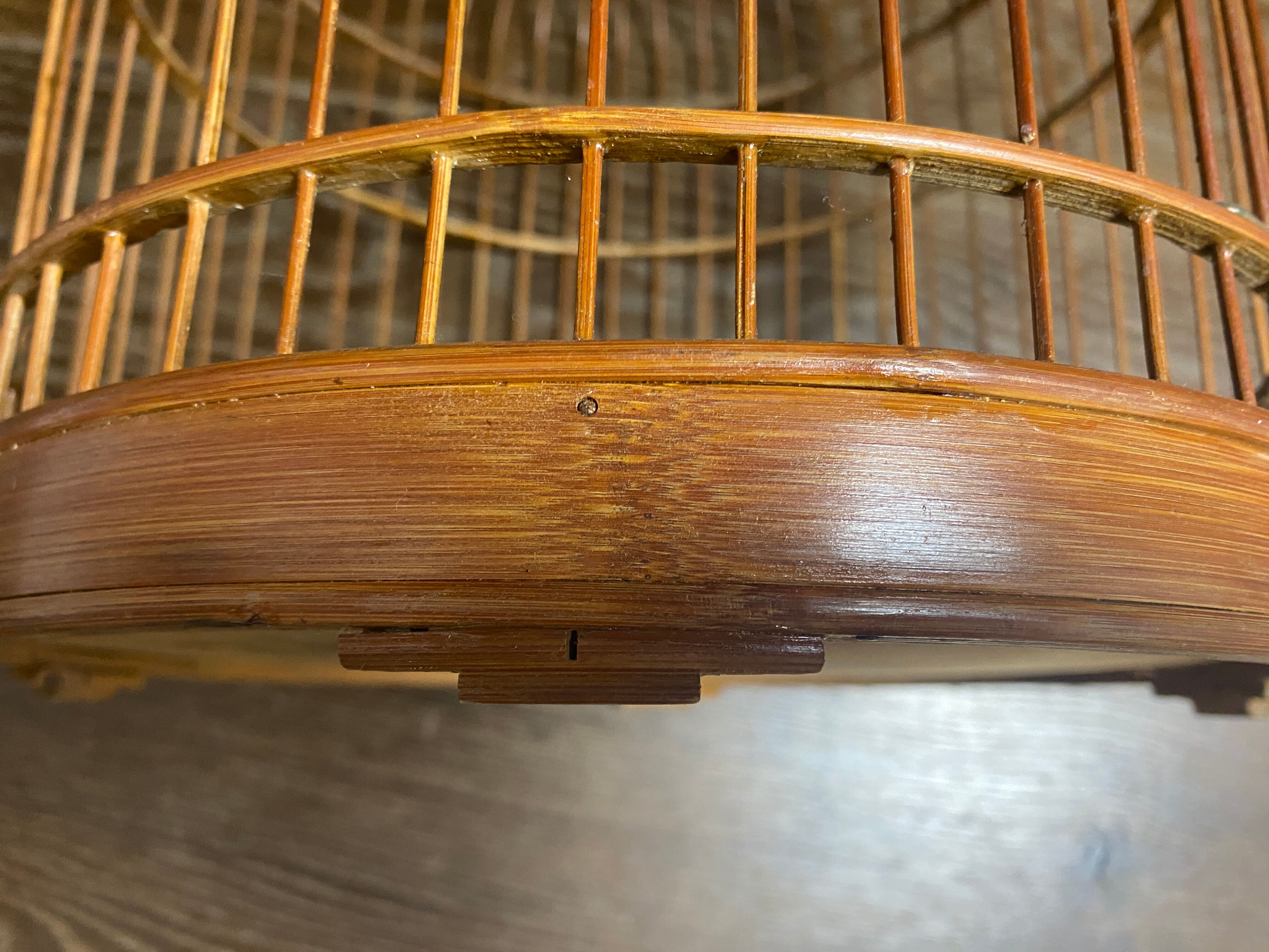 Old bird cage made of bamboo and wood