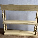 Skated wooden coil shelf