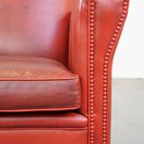 Fauteuil en cuir de mouton rouge