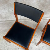 2 wooden and faux leather chairs in Scandinavian style