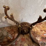 Pair of Louis XV style wall sconces in gilded bronze with glass pendants.