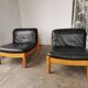 Pair of designer leather armchairs 80s