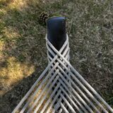 Harp style armchair