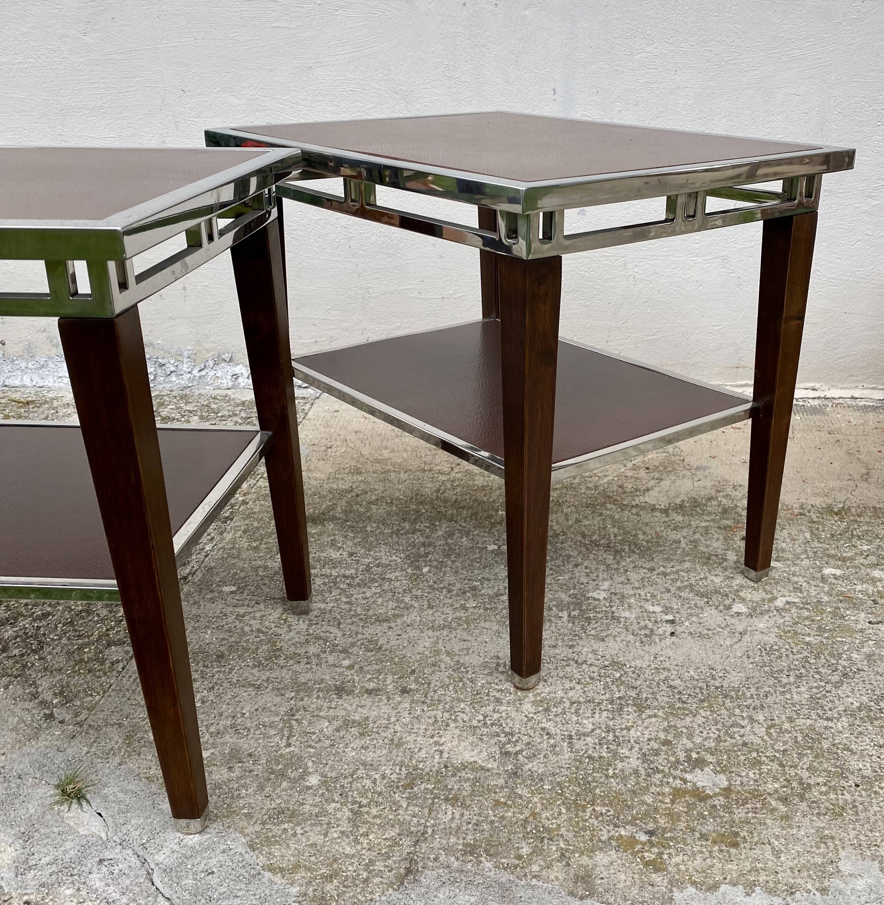 Pair of modernist chrome, leather and wood side tables