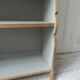 Small vintage bookcase, 5 fixed shelves, interior sublimated in verdigris, waxed finish.