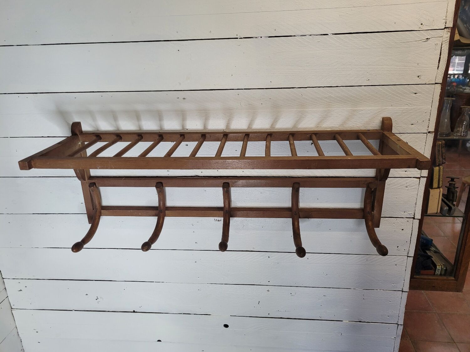 Curved wooden coat rack