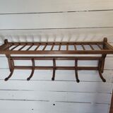 Curved wooden coat rack