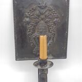 Wall-moving candlestick