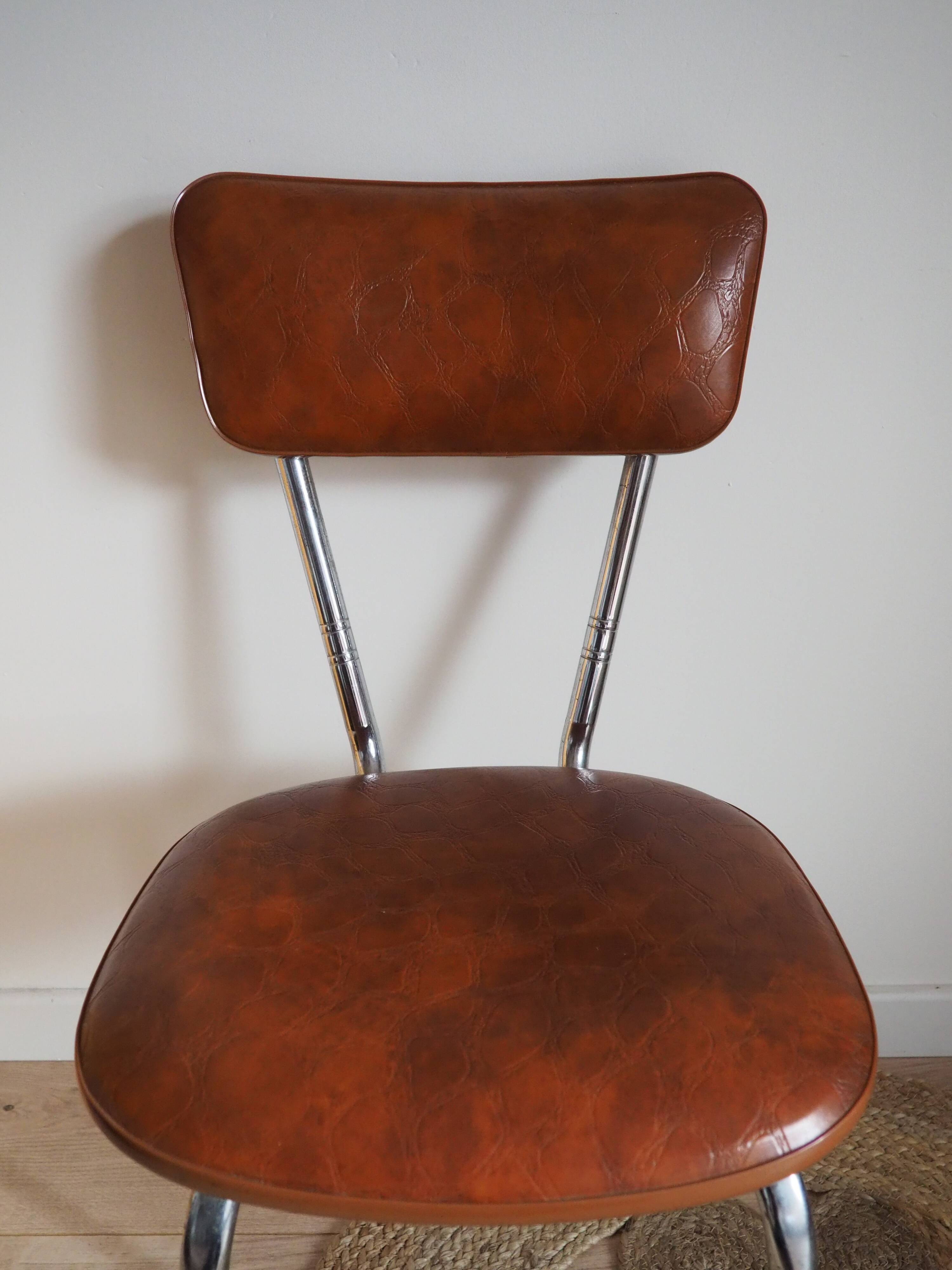 Brown faux leather chair
