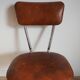 Chaise en simili cuir marron