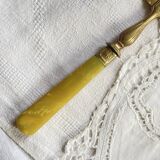 Pie server cake dessert in gold metal vintage silverware yellow bakelite handle