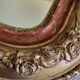 Miroir Louis-Philippe en bois et stuc doré à décor floral, XIXe, 43x38 cm
