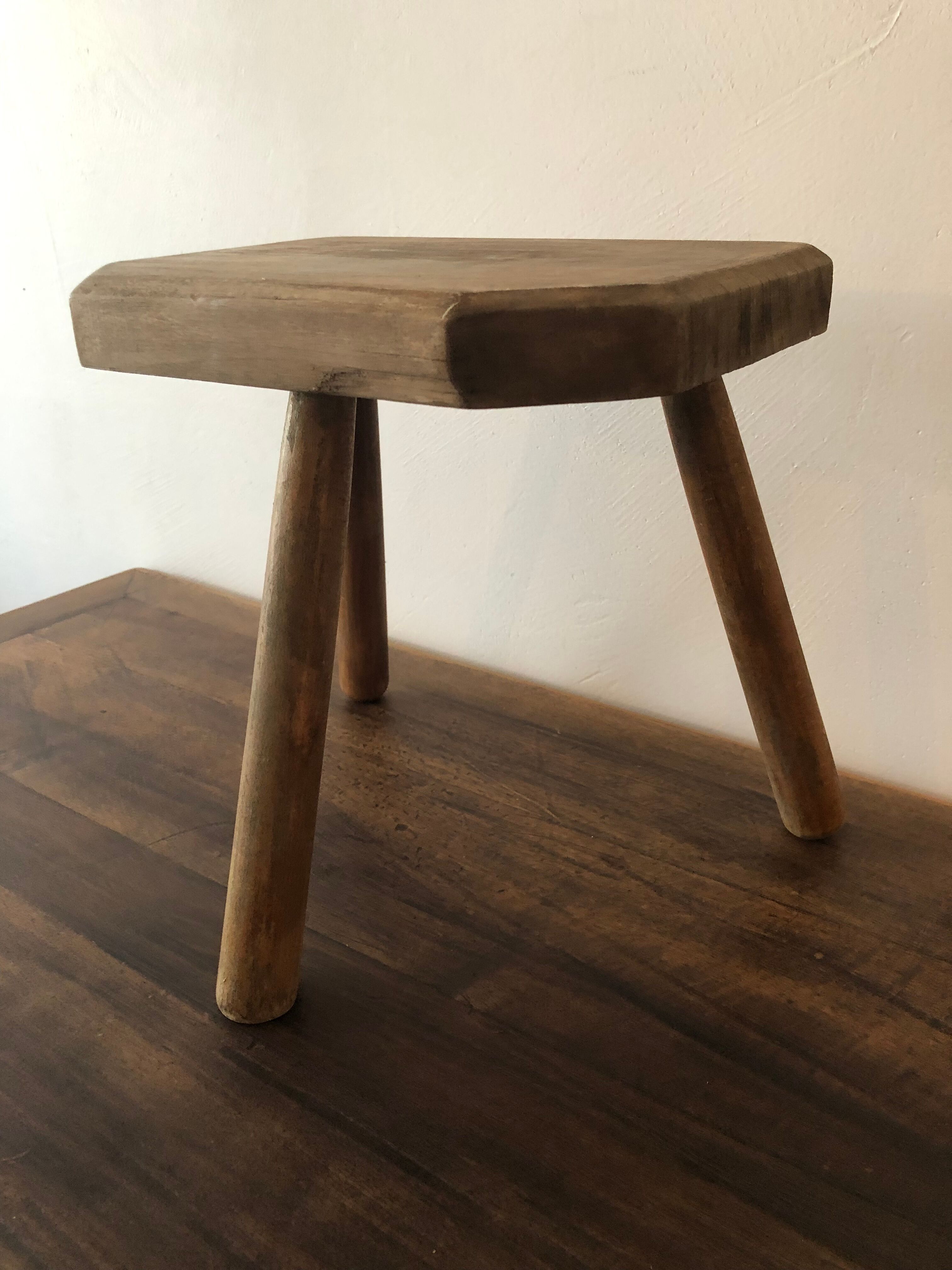 Wooden tripod stool