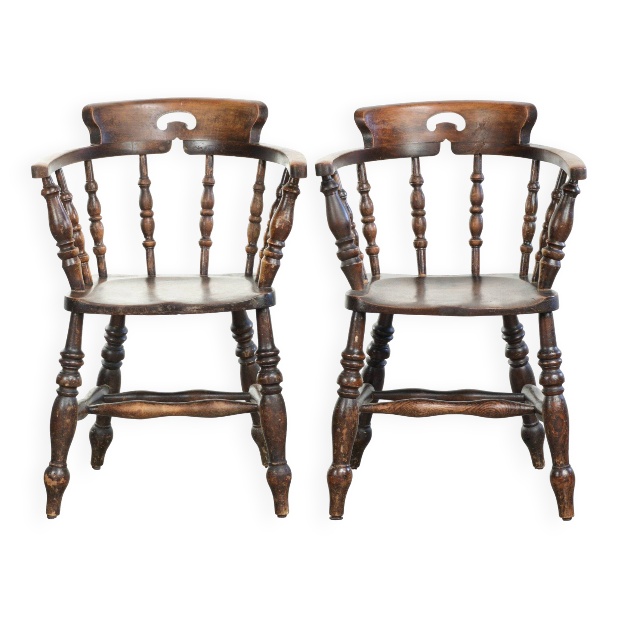 Set of two wooden English antique captain chairs from the late 19th century