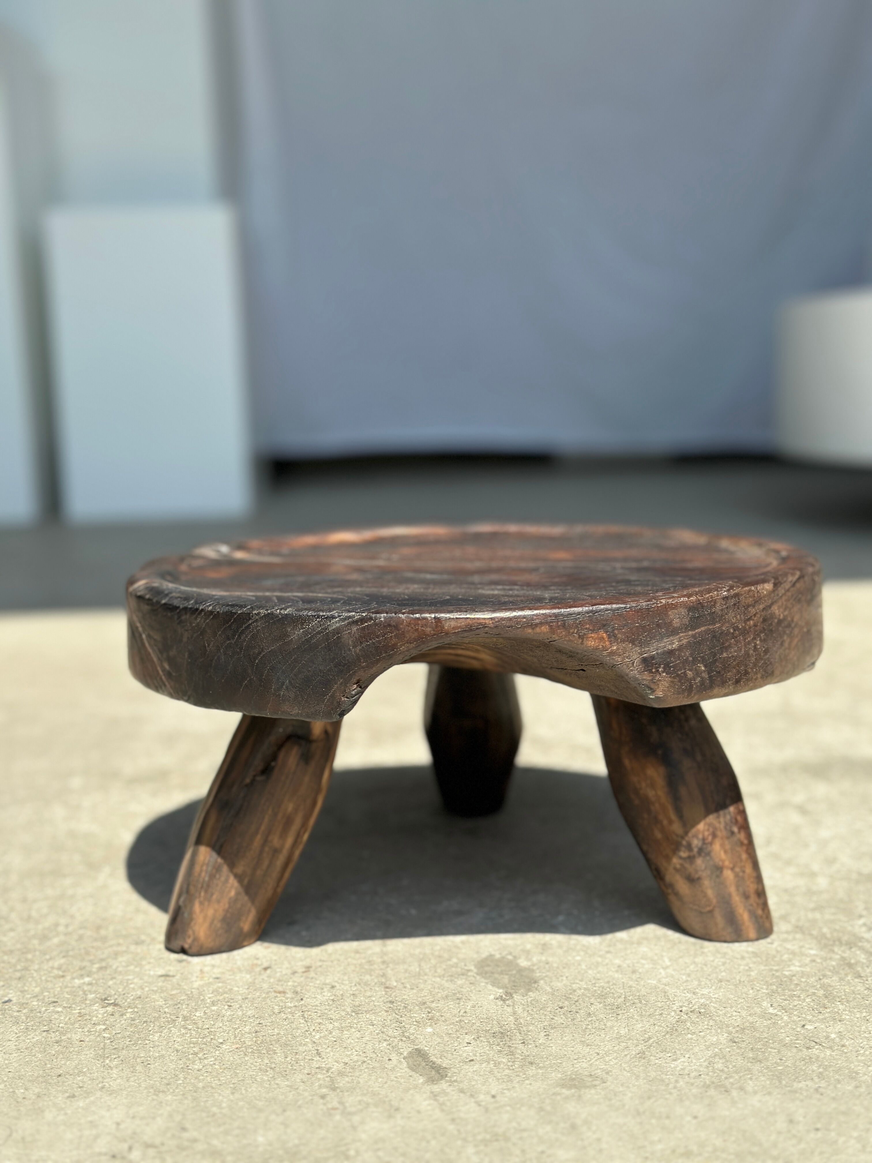 Small tripod stool low in dark brown upcycled teak